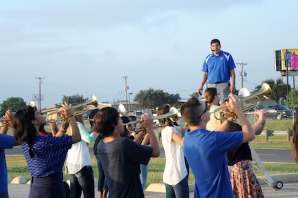 Hector Perez, Randolph High School band director, leads the Ro-Hawks
Marching Aug. 28 at Randolph High School.  (U.S. Air Force photo by Melissa
Peterson/released)
