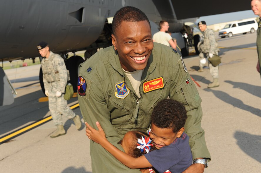 Airmen from the 23rd Bomb Squadron, 5th Maintenance Group and other units throughout Minot Air Force Base returned home, Sept. 1, from a deployment to Andersen AFB, Guam.  Their five-month deployment to Andersen AFB was in direct support of U.S. Pacific Command’s Continuous Bomber Presence designed to enhance security in the Asia-Pacific region by providing prudent deterrent capability. (U.S. Air Force photo/Airman 1st Class Apryl Hall)