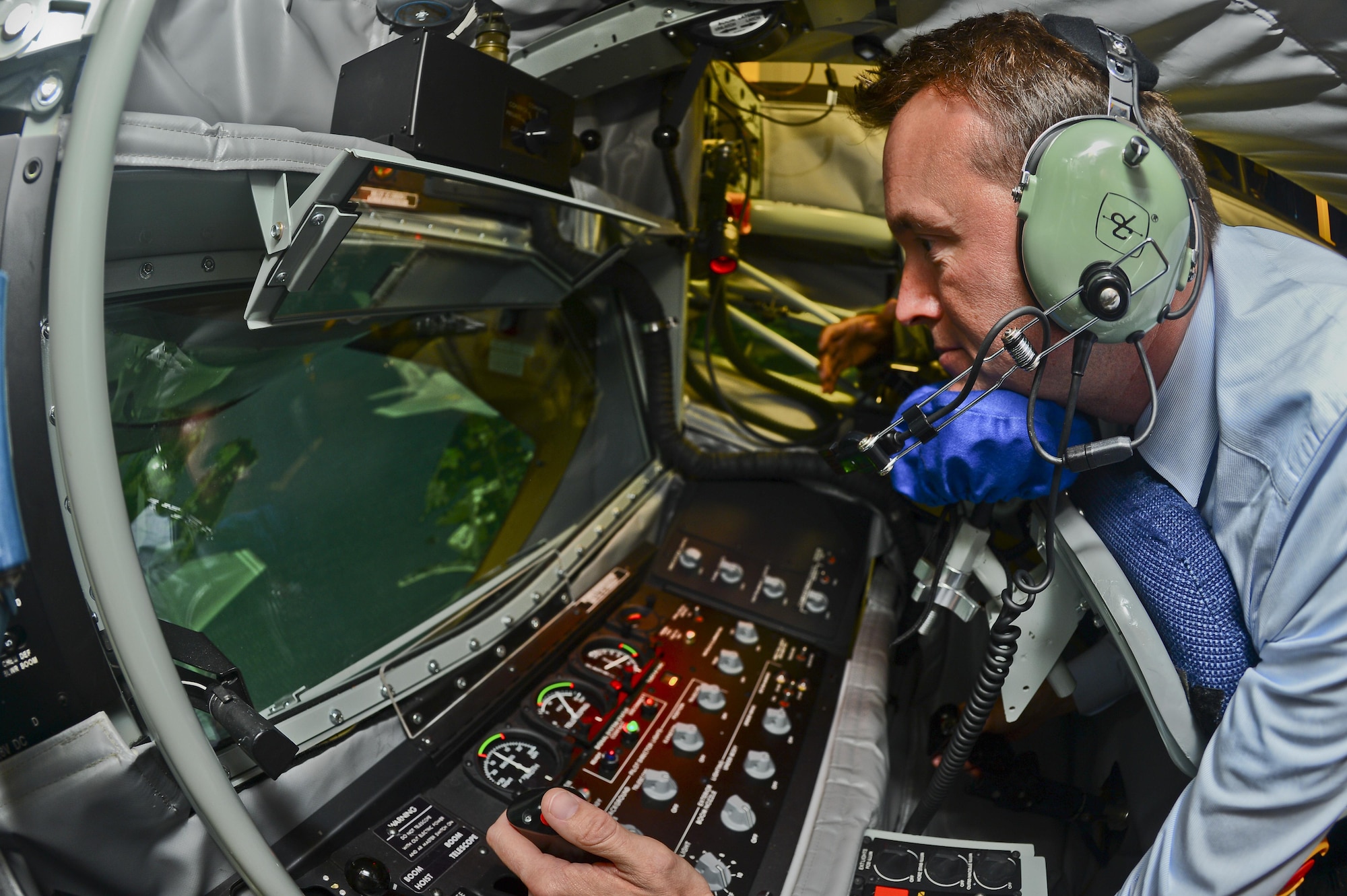 The Acting Secretary of the Air Force Eric Fanning receives lessons on MacDill's Boom Operator Weapon Systems Trainer Aug. 29, 2013, at MacDill Air Force Base, Fla. The BOWST is a fully simulated, large-scale procedural trainer for aerial refueling with replicated aircraft systems, controls, and functions within a complete aircrew boom compartment. (U.S. Air Force photo/Ned T. Johnston)