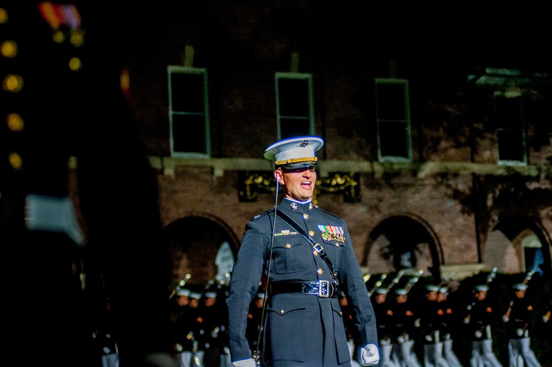 Capt. Matthew Smith, U.S. Marine Corps Silent Drill Platoon commander, performs during a Friday Evening Parade at Marine Barracks Washington, D.C., Aug. 30.  (Official Marine Corps photo by Lance Cpl. Dan Hosack/Released)