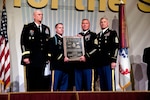 From left: Gen. Raymond T. Odierno, Lt. Col. Ron Cupples, Command Sgt. Maj. Greg Widberg, and Sgt. Maj. Raymond F. Chandler III, Sergeant Major of the Army, pose for a picture after Odierno presented the Walter T. Kerwin Jr. Readiness Award to Cupples.