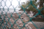 Wood and other debris slams onto the shore of Staten Island, N.Y., as Hurricane Sandy approaches in New York Harbor, Oct. 29, 2012.