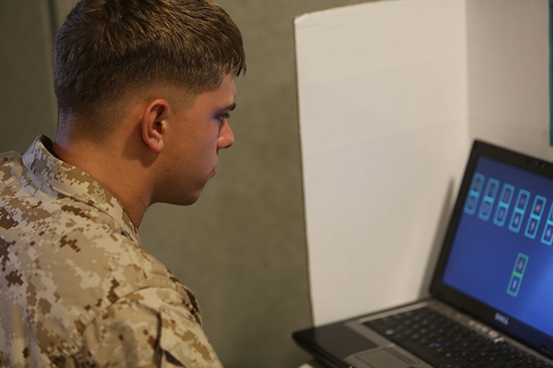 A Marine with 7th Engineer Support Battalion, 1st Marine Logistics Group, takes the Automated Neuropsychological Assessment Metrics test as part of the unit's pre-deployment training, aboard Camp Pendleton, Calif., Sept. 4, 2013. The test consists of 50 questions taken over a 20 minute period and assesses different brain functions to ensure Marines are ready for deployment. 