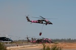 Air crews from the California Army National Guard take off in a UH-60 Black Hawk helicopter as they take part in wildfire suppression efforts in Northern California. Members of the California National Guard have been assisting the U.S. Forest Service and the California Department of Forestry and Fire Protection with extinguishing wildfires throughout the state.