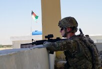 Kentucky Agribusiness Development Team 4’s Spc. Keith Stanley of Frankfort, Ky., provides security during a mission on June 8, 2012.