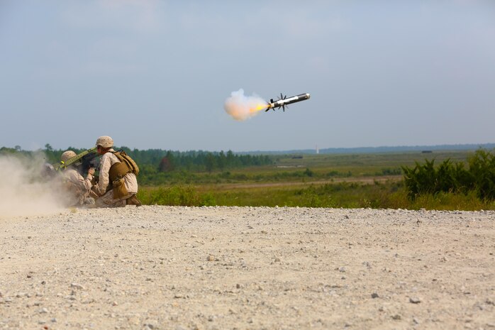 Sergeant Patrick Harrington, an anti-tank missileman with 2nd Battalion, 9th Marine Regiment, and Sgt. Michael Lesiewicz, also an anti-tank missileman with the unit, fire a FGM-148 Javelin missile during a live fire training exercise aboard Marine Corps Base Camp Lejeune, Aug. 29, 2013. Six javelins and 19 BGM-71 Tube launched, Optically tracked, Wire-guided missiles (TOW missile) were fired in the training exercise.