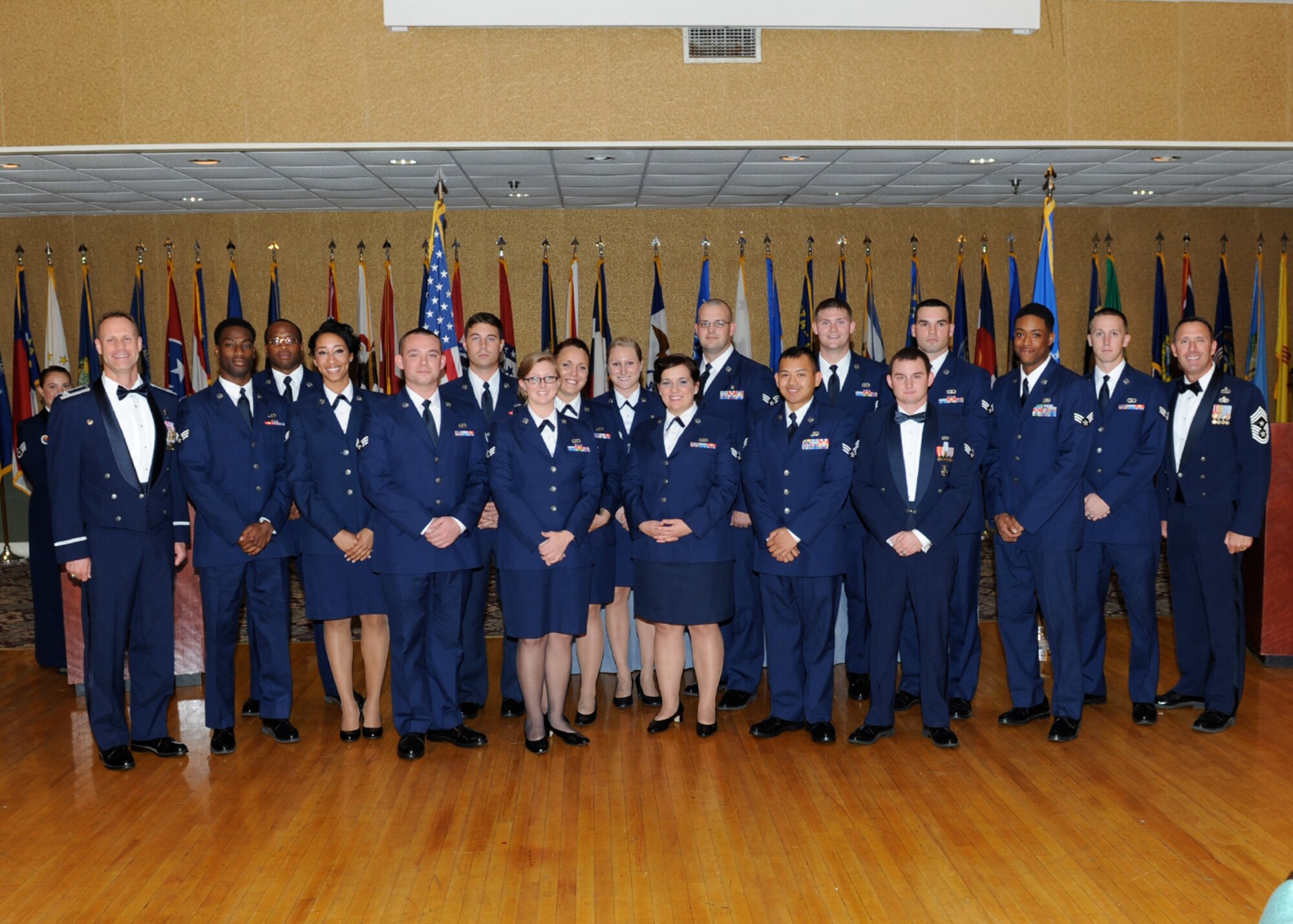 The sixteen graduates of Airman Leadership School Class 13-6 pause for a photo with Col. Jim Sears, 14th Flying Training Wing Commander, Chief Master Sgt. Vance Kondon, 14th FTW Command Chief, and guest speaker Chief Master Sgt. Leonard Thibodeaux, 14th Mission Support Group Superintendent. ALS is a five-week long professional military education course that arms Airmen with the skills and knowledge needed to perform as front-line supervisors in the Air Force. (U.S. Air Force/Elizabeth Owens)