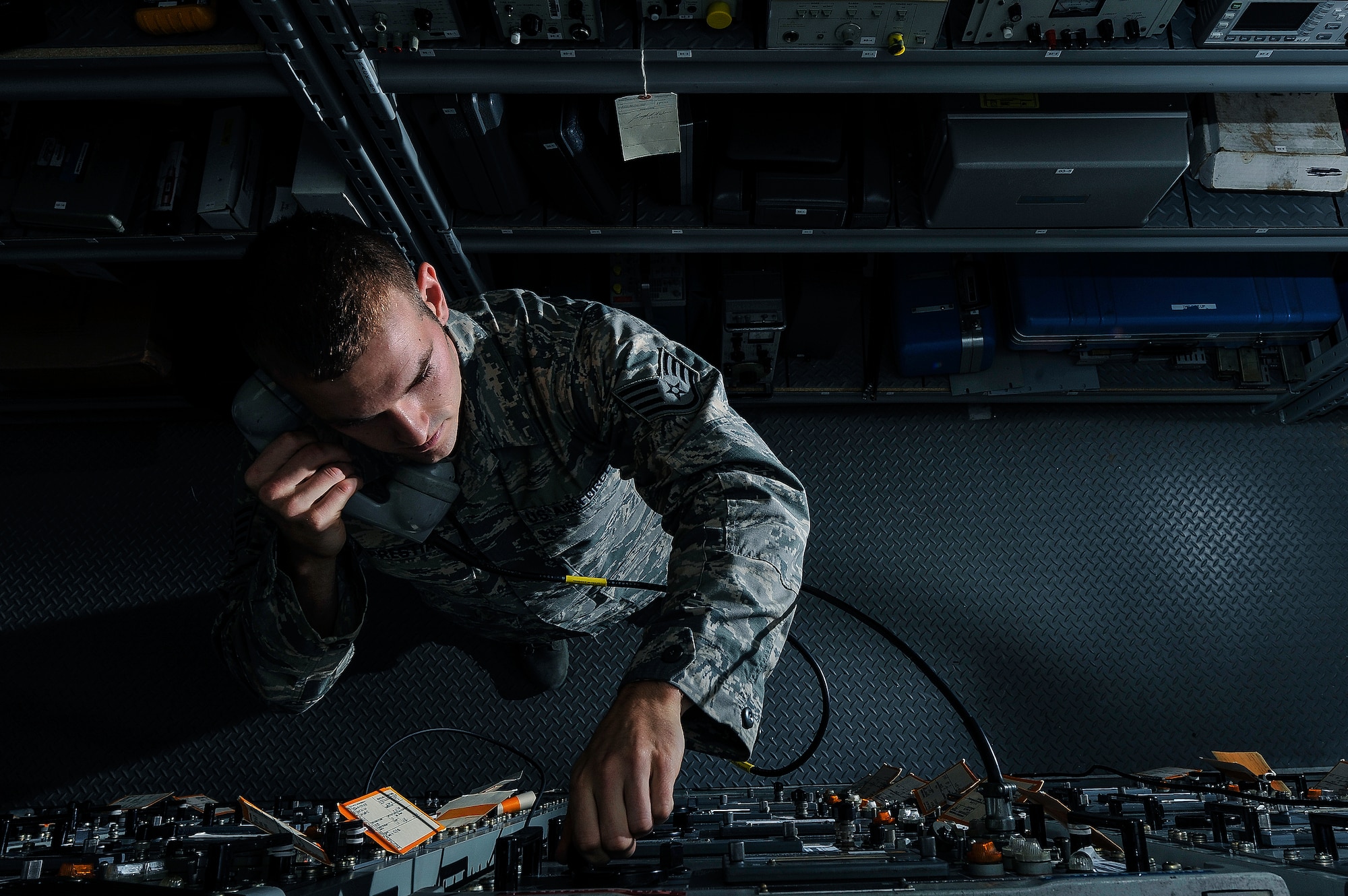 Staff Sgt. Richard Prestia, a 19th Communications Squadron airfield systems supervisor, performs maintenance on a radio Sept. 3, 2013, at Little Rock Air Force Base, Ark. Prestia, a Boyertown, Pa. native, ensures audio and power levels are within the required limits that enable the radio to talk with aircraft at distances of approximately 300 miles. (U.S. Air Force photo by Staff Sgt. Russ Scalf)