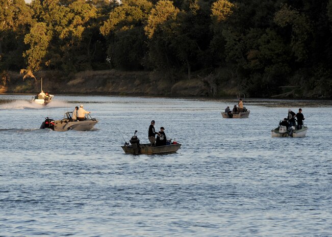 Team Beale and local community members participate in a fishing tournament supporting local Wounded Warriors on the Sacramento River near North Sacramento Calif., Aug. 24, 2013. Balfour Beatty hosted the tourney which raised nearly $10,000. (U.S. Air Force photo by Staff Sgt. Robert M. Trujillo/Released) 