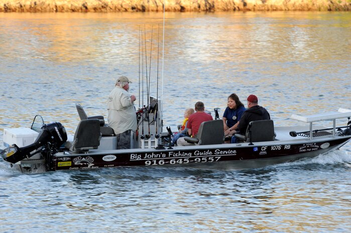 Members of Team Beale head out for a day of fishing during a fishing tournament supporting local Wounded Warriors on the Sacramento River near North Sacramento Calif., Aug. 24, 2013. Balfour Beatty hosted the tourney and supplied local fishing guides to participants. (U.S. Air Force photo by Staff Sgt. Robert M. Trujillo/Released)