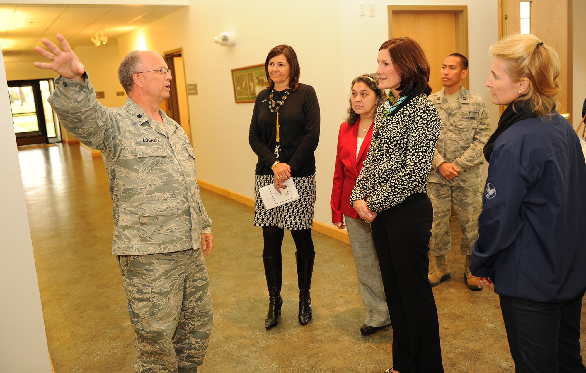 Chaplan (Lt. Col.) Kevin Lockett briefs Betty Welsh, wife of Air Force Chief of Staff Gen. Mark A. Welsh III, and Athena Cody, wife of Chief Master Sgt. of the Air Force James Cody, Aug. 30, 2013,Eielson Air Force Base, Alaska.  As part of the general’s two-week tour of the Pacific, Welsh and Cody met with spouses and families about programs and specific issues related to family care in the region. (U.S. Air Force photo by Mr. Scott Ash/Released)