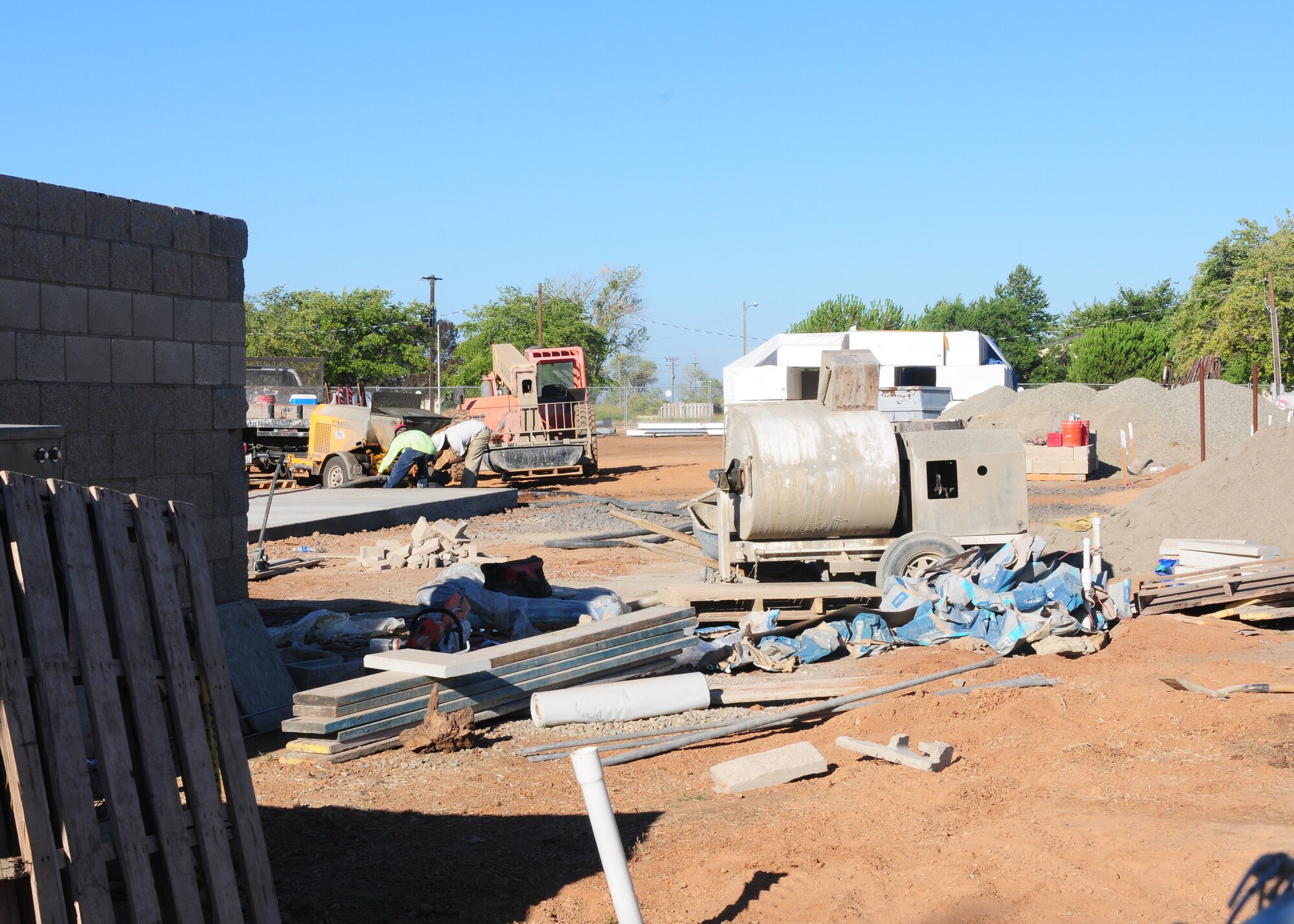 Contractors work on the new Wing Operations & Training Facility at Beale Air Force Base, Calif., Sept. 5, 2013. The building will house the 162nd Combat Communications Group, a California Air National Guard unit based out of Sacramento. (U.S. Air Force photo by Senior Airman Allen Pollard/Released)