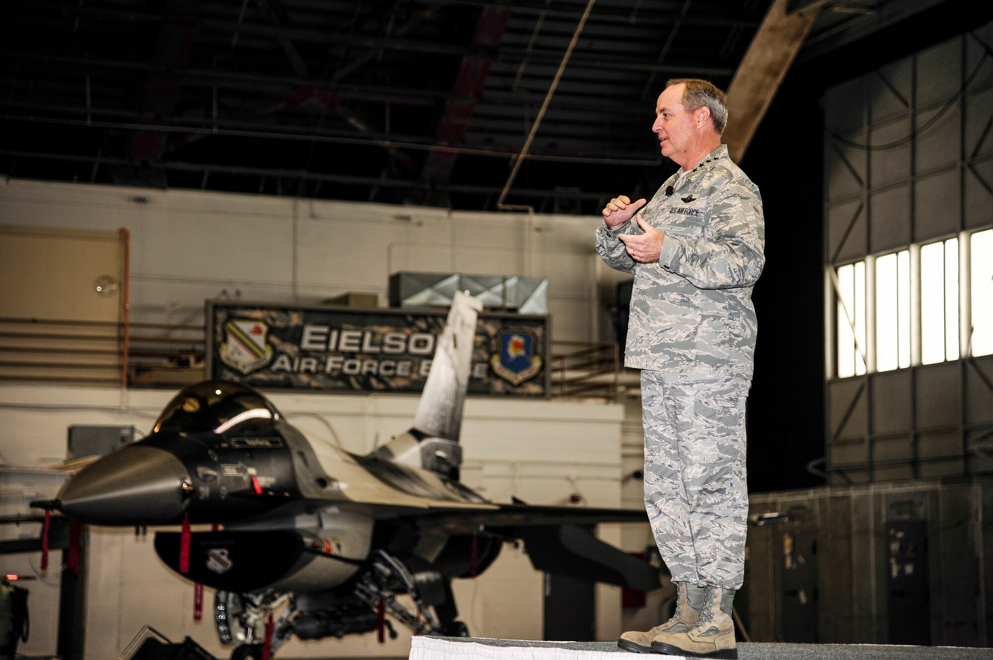 Air Force Chief of Staff Gen. Mark A. Welsh III addresses Airmen during a speech Aug. 30, 2013, Eielson Air Force Base, Alaska. Eielson was the final stop on a two-week long tour of the Pacific region in which he discussed Air Force key issues and opportunities and challenges in the region.  Welsh, along with his wife, Betty, and Athena Cody, wife of Chief Master Sgt. of the Air Force James Cody, met with Airmen and their families at various locations on the base to thank them for their dedication and sacrifice. (U.S. Air Force photo by Senior Airman Zachary Perras/Released)