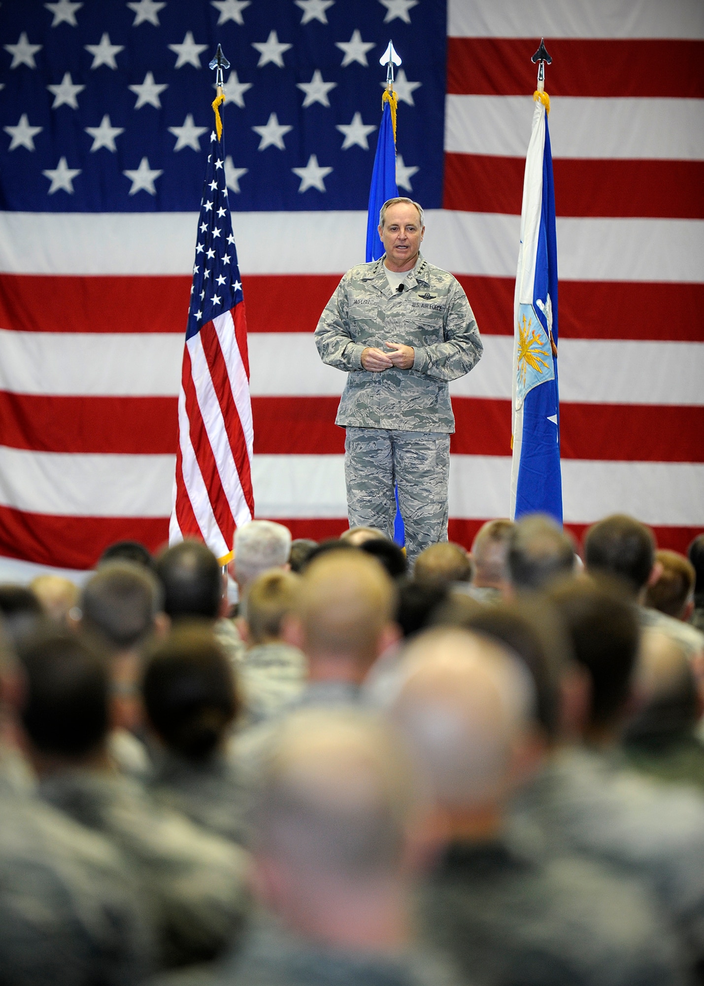 Air Force Chief of Staff Gen. Mark A. Welsh III addresses Airmen during a speech Aug. 30, 2013, Eielson Air Force Base, Alaska. Eielson was the final stop on a two-week long tour of the Pacific region in which he discussed Air Force key issues and opportunities and challenges in the region.  Welsh, along with his wife, Betty, and Athena Cody, wife of Chief Master Sgt. of the Air Force James Cody, met with Airmen and their families at various locations on the base to thank them for their dedication and sacrifice. (U.S. Air Force photo by Senior Airman Shawn Nickel/Released)