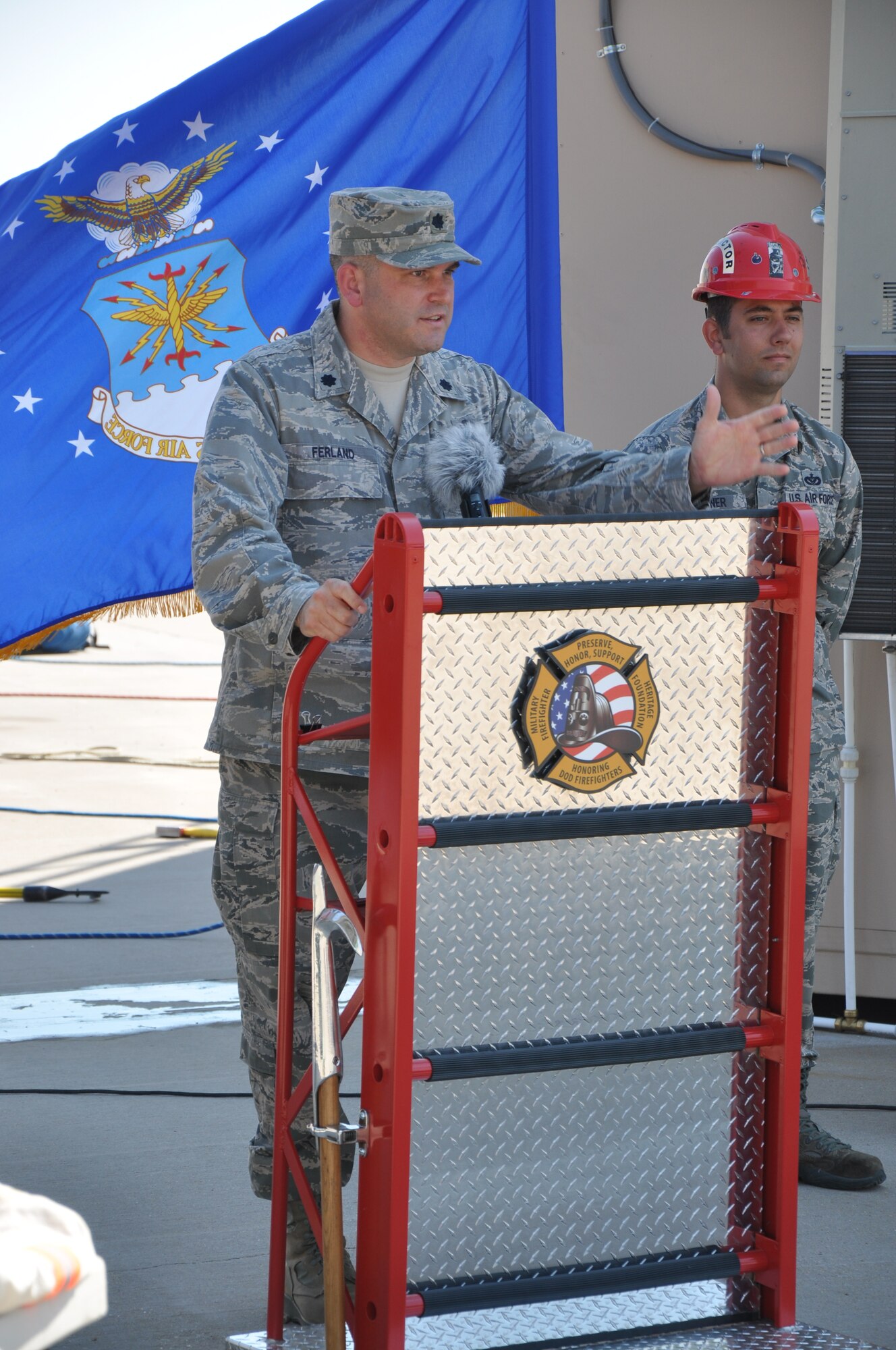 GOODFELLOW AIR FORCE BASE, Texas – Lt. Col. Derek Ferland, 312th Training Squadron Commander, speaks during the 312th Training Squadron new firefighter trainer dedication Aug. 30. Ferland’s speech concentrated on how the new trainer focuses on the use of team work. (U.S. Air Force photo/ Airman 1st Class Joshua Edwards)