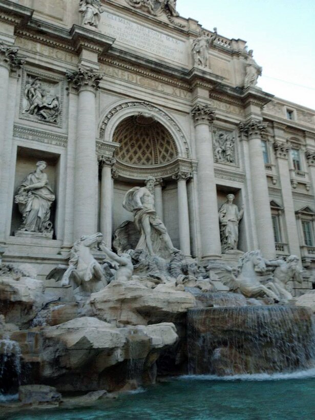 Designed by Nicola Salvi in 1732, the fountain is one of the largest Baroque fountains in the city and one of the most famous in the world. Nearly 3,000 euro is thrown into the fountain each day by tourist, which is collected and used to subsidize a supermarket for Rome’s low-income population.  (U.S. Air Force photo/ Senior Airman Michael Battles)