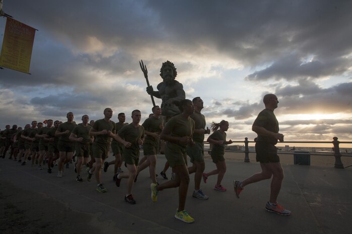 Col. Paul Ryan, commanding officer, Headquarters and Service Battalion, U.S. Marine Corps Forces Command, leads his Marines on a formation run along the Virginia Beach Boardwalk Sept. 6. According to Ryan, he wanted to increase the Marines' physical fitness while building unit morale and esprit de corps.