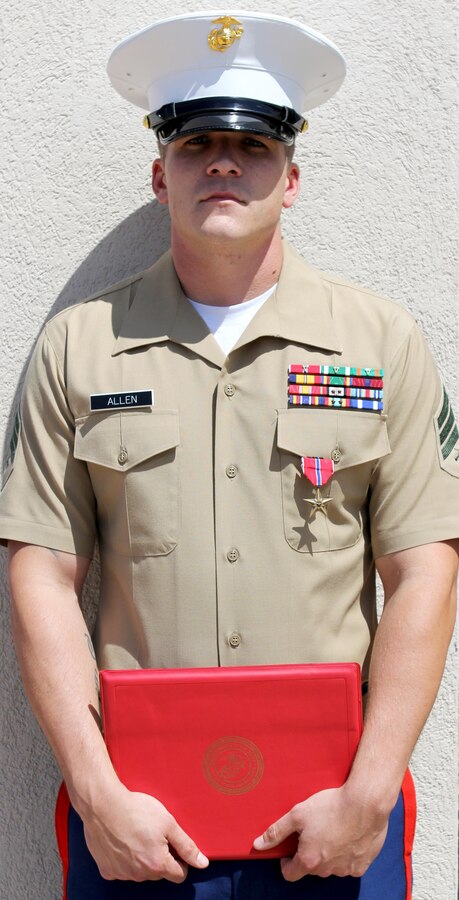 Sergeant Dallas Allen, a recruiter with Recruiting Substation Oklahoma City South, Recruiting Station Oklahoma City is awarded the Bronze Star with the combat distinguishing “V” device, for valor at the Oklahoma City Memorial Aug. 23. The rifleman, who served more than five years with the Marine Corps.