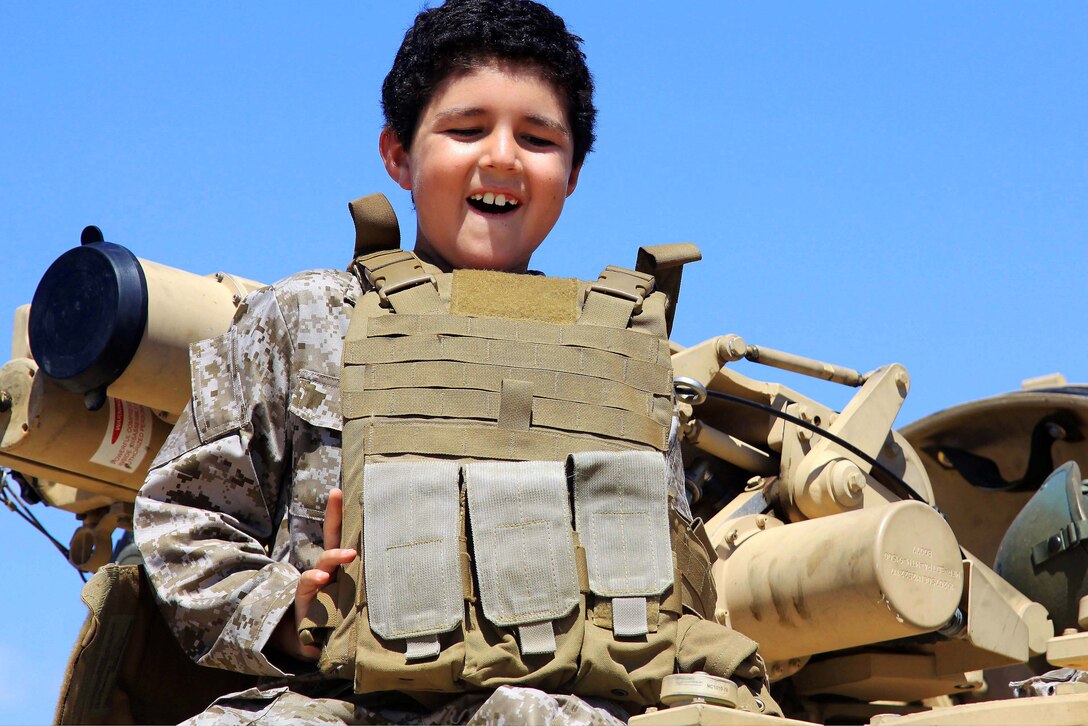 Baden smiles after his tank ride on Camp Pendleton Sept. 4. 7-year-old Baden was diagnosed with Acute Lymphoblastic Leukemia December 10, 2010. “I’ve always wanted to ride in a tank,” said Baden. “It’s just something no one else has done.”