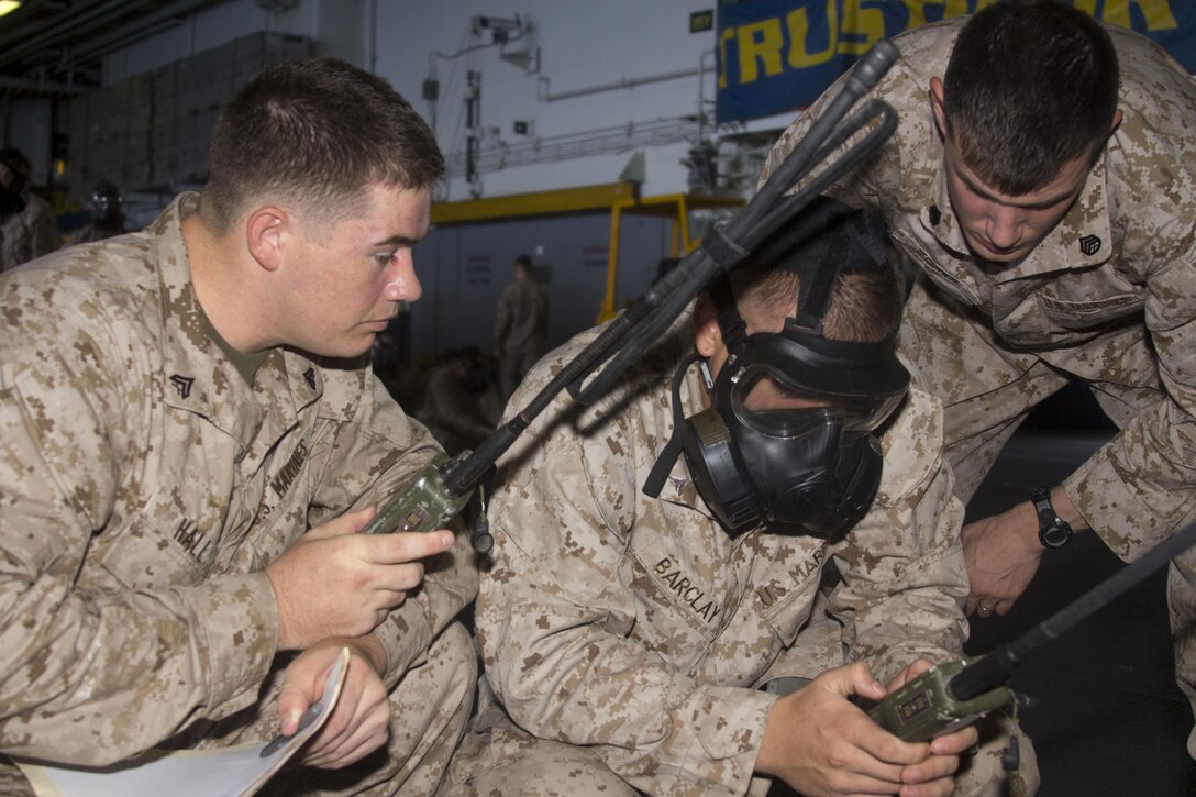 U.S. Marines with India Co., Battalion Landing Team 3/2, 26th Marine Expeditionary Unit (MEU), practice calling in a nine-line casualty evacuation request during a team leader’s course, in the hangar bay of the USS Kearsarge (LHD 3), at sea, Sept. 3, 2013. The 26th MEU is a Marine Air-Ground Task Force currently assigned to the U.S. 5th Fleet area of responsibility aboard the Kearsarge Amphibious Ready Group serving as a sea-based, expeditionary crisis response force capable of conducting amphibious operations across the full range of military operations. (U.S. Marine Corps photo by Cpl. Kyle N. Runnels/Released)