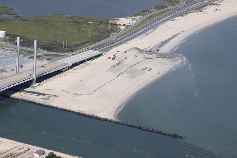 The U.S. Army Corps of Engineers Philadelphia District is helping restore the north shore of the Indian River Inlet by pumping more than half a million cubic yards of sand from the inlet onto the beach and constructing a dune. Hurricane Sandy caused overwash and flooding on the north shore, forcing Route 1 and the Indian River Inlet Bridge to close for several days.