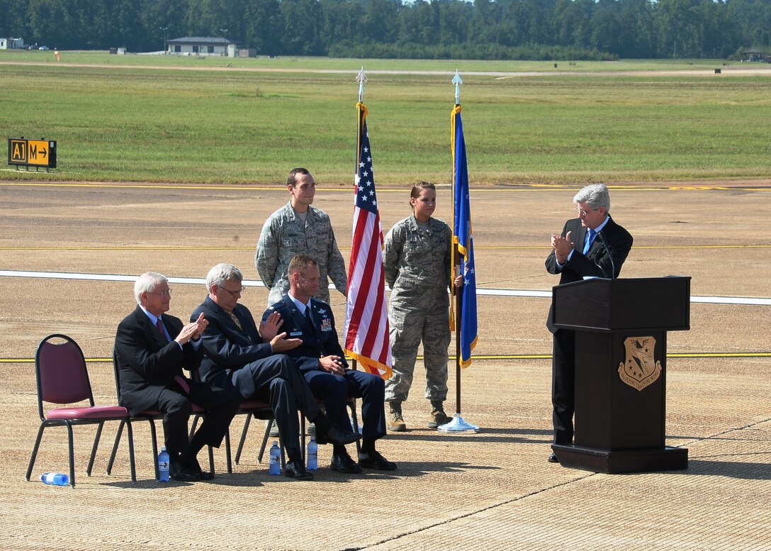 Mississippi's Governor, Phil Bryant, pauses during his address at the Columbus Air Force Base Runway Ribbon Cutting ceremony Sept. 6 to congratulate Col. Jim Sears, 14th Flying Training Wing commander and the men and women of Columbus AFB team for their accomplishments throughout the six-month runway re-construction project. The pilot training wing safely continued its mission despite the significant loss of capability. A Mississippi small business, Babcock Construction Company, executed the largest runway construction project in eight years in Air Education and Training Command, on-time and under-budget.
