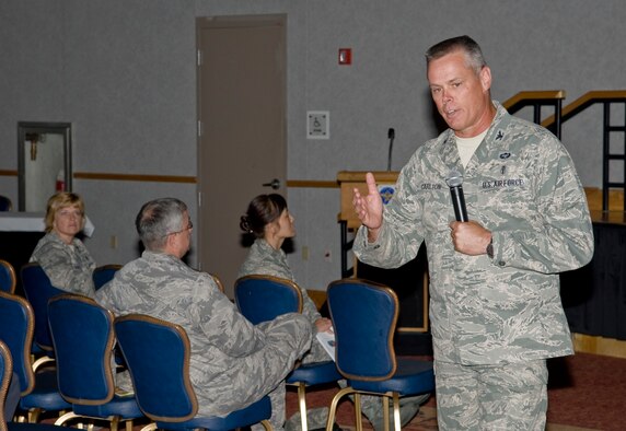 Col. Charles Carlton, 22nd Medical Group commander, answers questions about healthcare to an audience at the 22nd Air Refueling Wing Health Care Forum at the Robert J. Dole Community Center Sept. 5, 2013, at McConnell Air Force Base, Kan. Carlton and other medical group leadership helped explained their goals and the changes happening at the medical group here to beneficiaries. (U.S. Air Force photo/Airman 1st Class John Linzmeier)