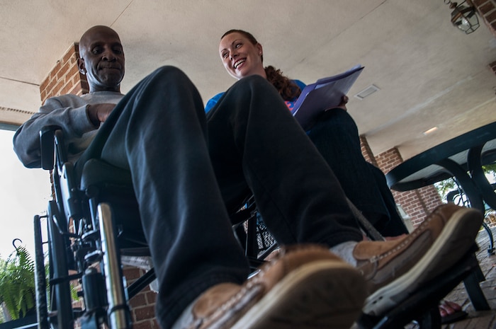 Tech. Sgt. Jessica Dicicco, 628th Medical Logistics NCO in charge of Storage and Distribution, interviews Isaac Blake, U.S. Marine Corps veteran, during the Day of Caring September 6, 2013 at Mt. Pleasant Manor, Mt. Pleasant, S.C. Approximately 2,500 service members from JB Charleston participated in the Day of Caring, volunteering their skills to assist with more than 50 projects in the local community. The base held their volunteer events a week earlier than Trident United Way's Day of Caring, due to events surrounding the delivery of the final U.S. Air Force C-17 Globemaster III.  (U.S. Air Force photo/Senior Airman Ashlee Galloway)