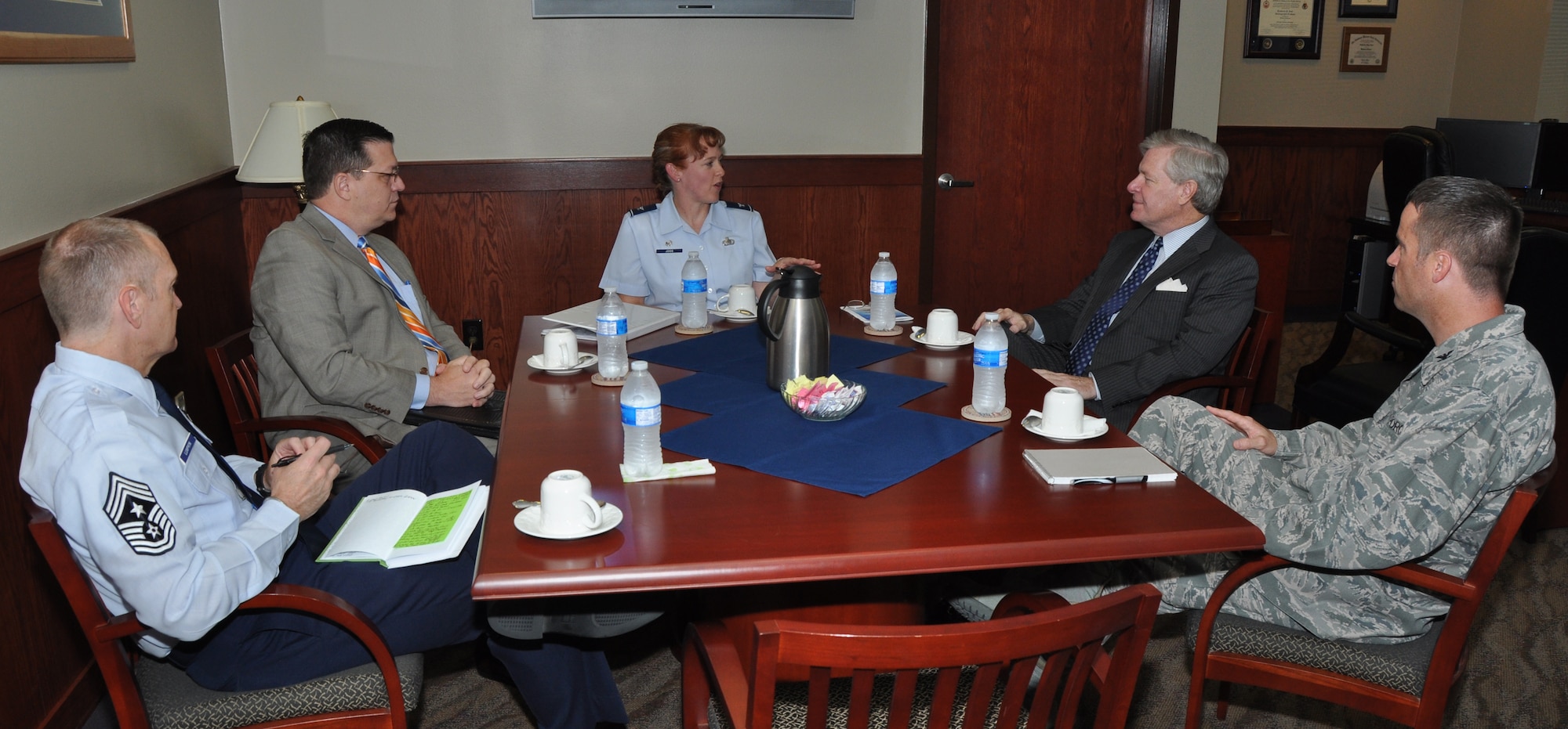 GOODFELLOW AIR FORCE BASE, Texas - John Steen, Texas Secretary of State, and Keith Ingram, Texas Director of Elections, meet with Col. Kimberlee Joos, 17th Training Wing Commander, Col. Thomas Schmidt, 17th TRW Vice Commander, and Chief Master Sgt. Scott Lumpkin, 17th TRW Command Chief, in Col. Joos’ office, before meeting with tenant unit and group leadership Sept. 4. Steen and Ingram educated Goodfellow leadership and voting assistance officers about a new voter system requiring photo identification. (U.S. Air Force photo/ Airman 1st Class Joshua Edwards)