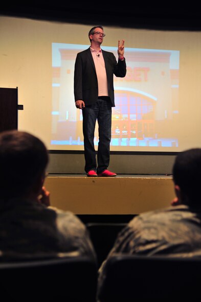 Dr. David Rendall, local leadership professor and speaker, talks to U.S. Air Force Airmen during the 4th Fighter Wing Leadership Lecture Series: The Freak Factor, at Seymour Johnson Air Force Base, N.C., Sept. 5, 2013. Members of Team Seymour came out to listen to Rendall talk about finding success and improving performance by strengthening weaknesses. (U.S. Air Force photo by Senior Airman Aubrey White)