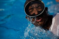 Staff Sgt. Stephaun McKinley swims laps during Rescue Athlete training clinic Aug. 23 at Joint Base San Antonio-Lackland. Mckinley participates in this 36-hour training clinic to help achieve his goal of cross training from security forces into Combat Control Team career field. (U.S. Air Force photo/Staff Sgt. Jonathan Snyder)