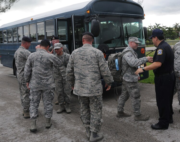 Airmen assigned to the 482nd Security Forces Squadron are greeted by their squadron leadership at Homestead Air Reserve Base, Fla., upon their return from a recent deployment to Transit Center at Manas, Krygyzstan, Sept. 4. (U.S. Air Force photo/Ross Tweten)