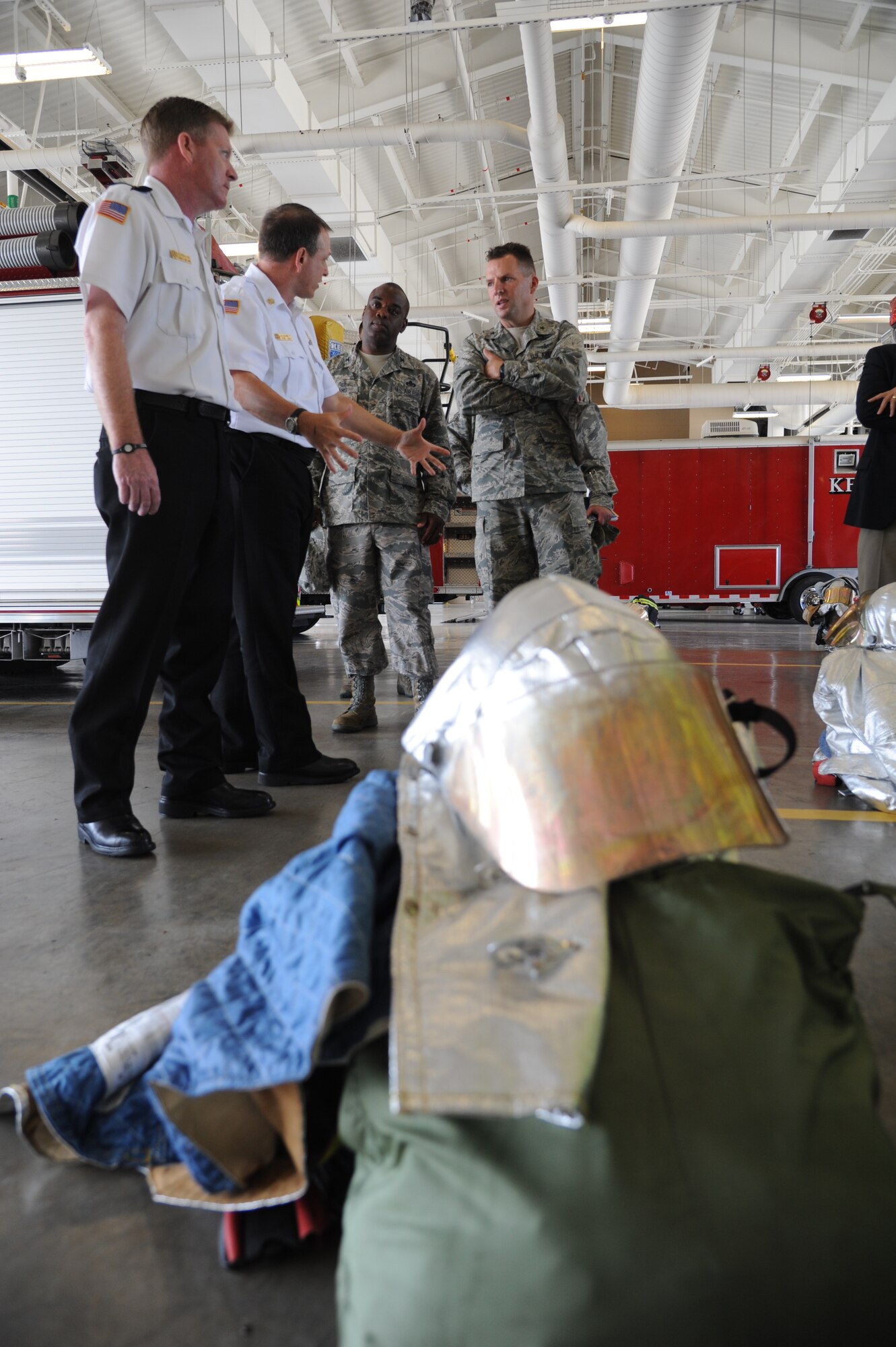 Gary Pierson, Fire Department deputy chief, and James Donnett, Fire Department chief, provide a tour of the fire emergency services to Col. Mark Vivians, 81st Mission Support Group commander, and Brig. Gen. Patrick Higby, 81st Training Wing commander, during an immersion tour of the 81st Mission Support Group Sept. 4, 2013, Keesler Air Force Base, Miss. The purpose of the tour was to learn the integration of the group operations and personnel.  (U.S. Air Force photo by Kemberly Groue)