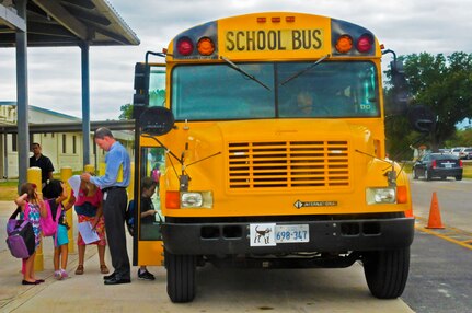 William Woodland, Randolph elementary school associate principle, ensures the children get on the right bus Aug. 27 in front of the elementary school at Joint Base San Antonio-Randolph. (U.S. Air Force photo by Airman 1st Class Kenna Jackson)
