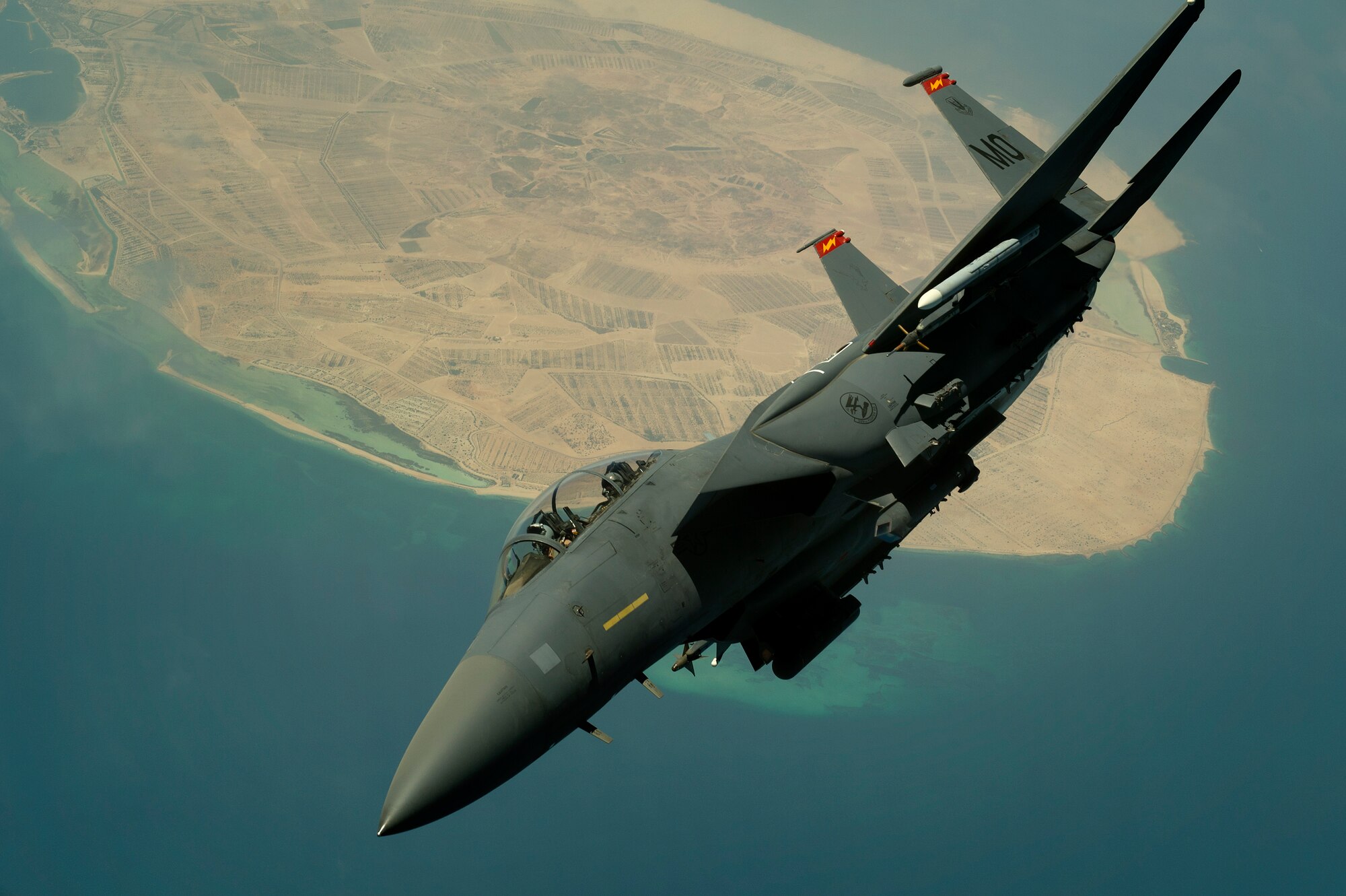 An F-15E Strike Eagle deployed from Mountain Home Air Force Base, Idaho, departs after receiving fuel from a KC-135R Stratotanker during a mission over the Persian Gulf, Aug. 30, 2013. (U.S. Air Force Photo/Master Sgt. Ben Bloker)
