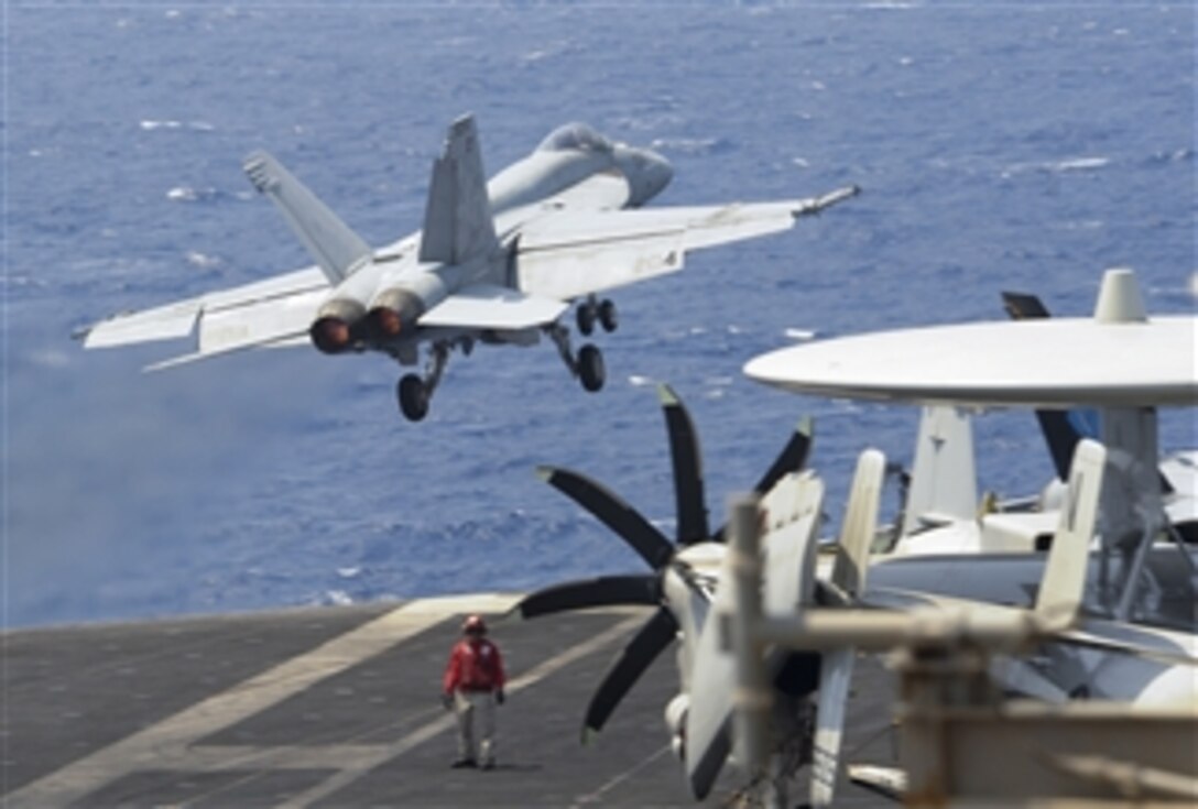 A U.S. Navy F/A-18E Super Hornet launches off the flight deck of the aircraft carrier USS Nimitz (CVN 68) as the ship conducts flight operations in the Red Sea on Sept. 4, 2013.  The Nimitz Carrier Strike Group is deployed to the U.S. 5th Fleet area of responsibility to conduct maritime security operations and theater security cooperation efforts.  The Super Hornet is attached to Strike Fighter Squadron 147.  