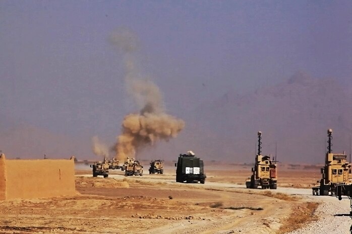 Marines conduct a controlled detonation of an improvised explosive device during a combat logistics patrol launched by Combat Logistics Regiment 2, Regional Command (Southwest), in Helmand province, Afghanistan, Aug. 28, 2013. Convoy personnel maintain a constant vigilance to detect and thwart the IED threat during logistics missions that can last for days at a time.