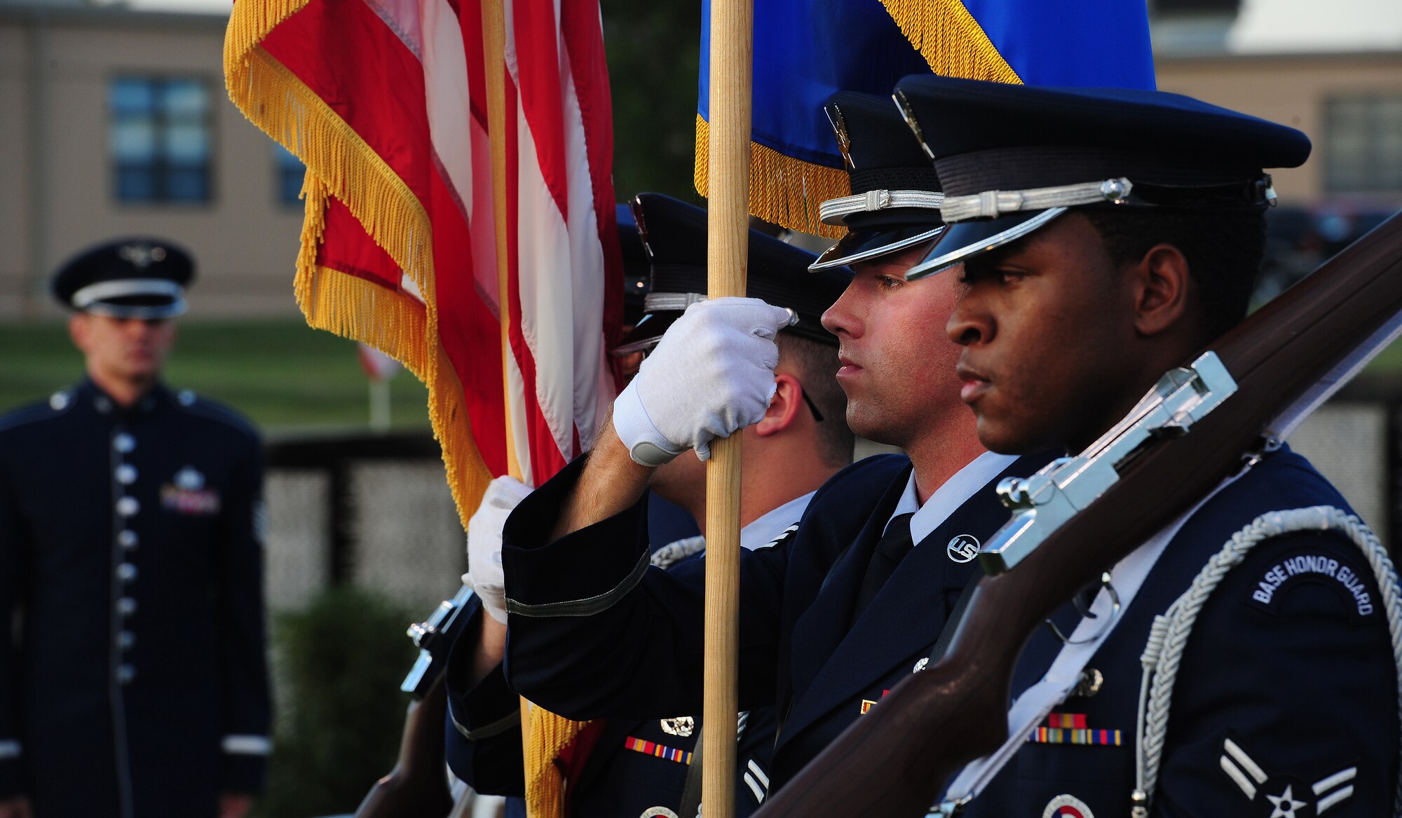 U.S. Air Force ceremonial guardsmen from the 509th Bomb Wing Honor Guard move to the position of right shoulder arms after presenting the colors at the Vietnam Traveling Memorial Wall opening ceremony in Concordia, Mo., Sept. 4, 2013. The names of approximately 58,000 Service members are engraved into the granite panels of the Vietnam Traveling Memorial Wall. (U.S. Air Force photo by Staff Sgt. Nick Wilson/Released)