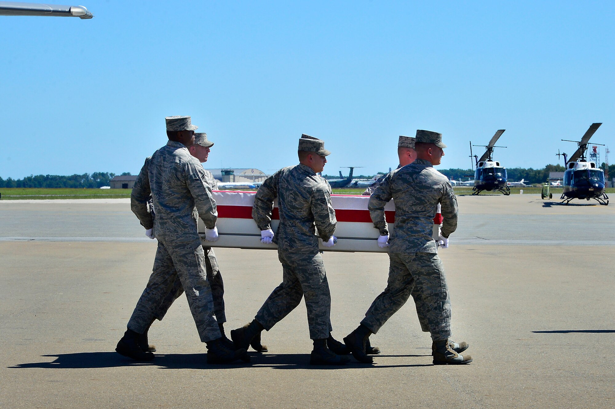 A U.S. Air Force carry team transfers the remains of Air Force Staff Sgt. Todd J. Lobraico Jr., of New Fairfield, Conn., at Dover Air Force Base, Del., September 07, 2013. Lobraico was assigned to the 105th Security Forces Squadron at Stewart Air National Guard Base, N.Y. (U.S. Air Force photo/David S.Tucker)
