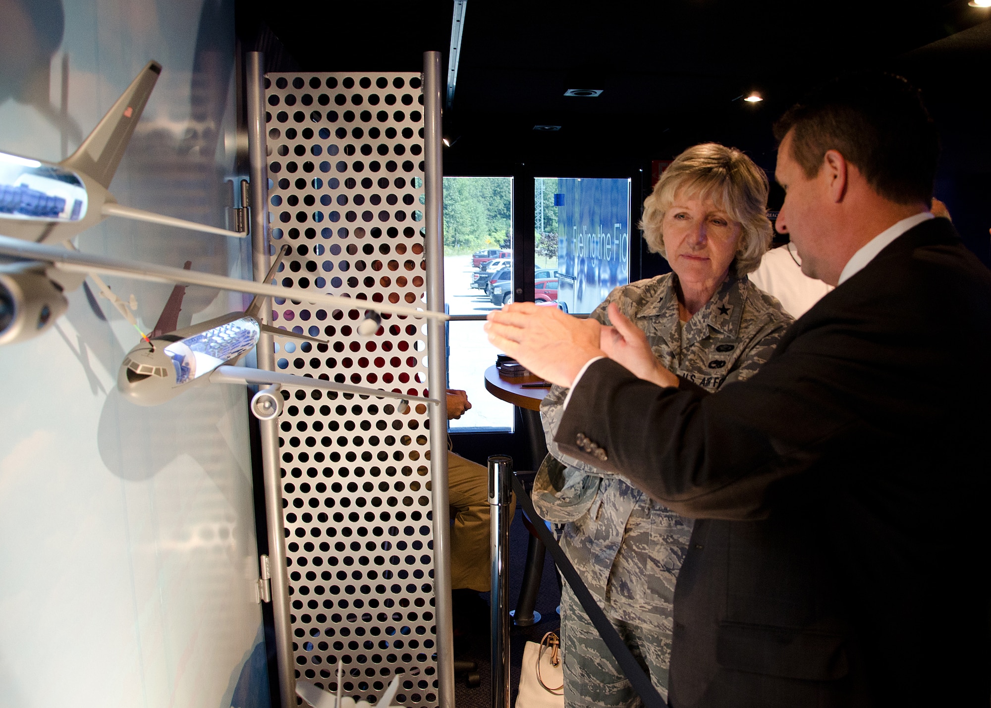 PEASE AIR NATIONAL GUARD, N.H. – New Hampshire Air National Guard Commander Brig. Gen. Carolyn J. Protzmann discusses the capabilities of the new KC-46A with James Eisenhart, Boeing Business Development director. Local civic leaders were invited to tour the Tanker Demonstration Trailer on the base. Wing personnel are invited to tour the trailer Sept. 7 from noon to 8 p.m. and Sept. 8 from 9 a.m. to 4 p.m. (Air National Guard photo by Tech. Sgt. Mark Wyatt/Released)