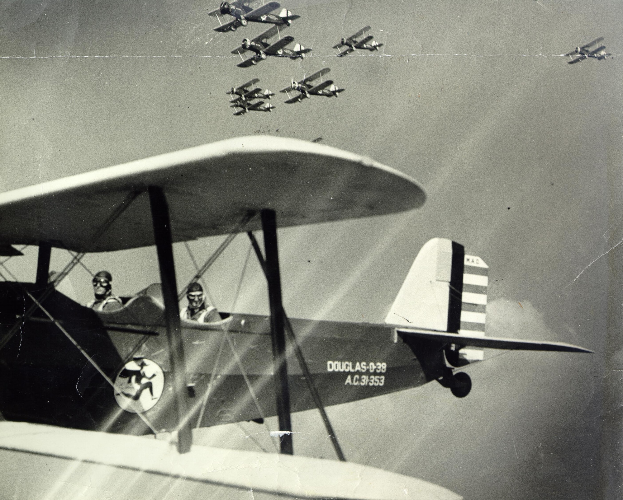 A formation of Douglas 0-38 aircraft emblazoned with the Flying Yankees insignia operated by aviators from the 118th Observation Squadron. The squadron flew the O-38 between 1931—1937. (U.S. Air National Guard file photo)