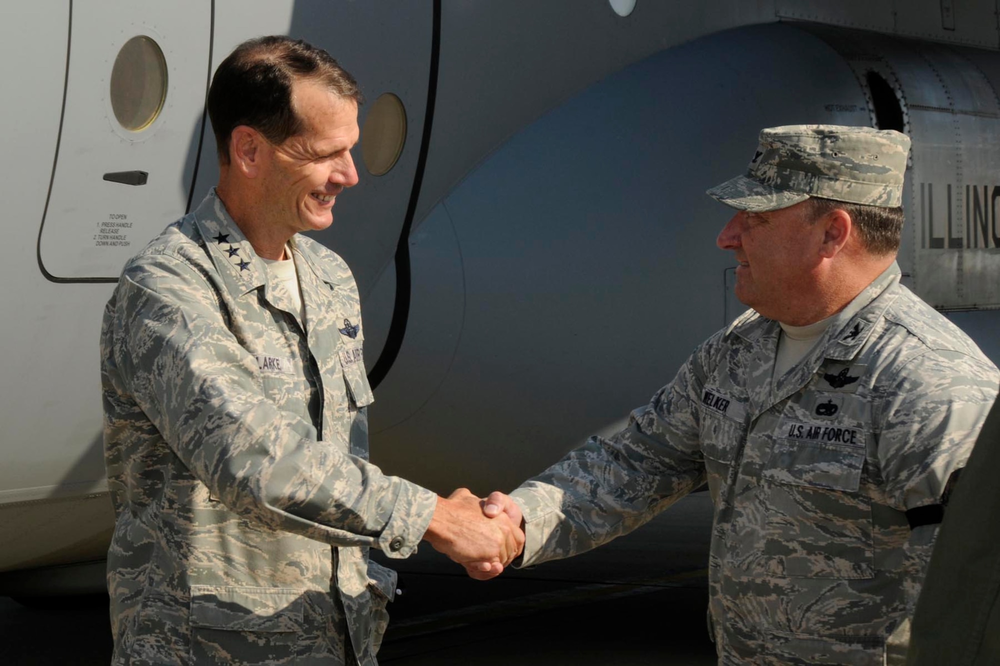 Lt. Gen. Stanley E. Clarke, Director of the Air National Guard, is greeted by Col. Barton Welker, Commander, 182nd Maintenance Group, after arriving for a site visit at the182nd Airlift Wing in Peoria, Ill. Sep. 6, 2013. (Air National Guard photo by Tech. Sgt. Todd Pendleton/released)