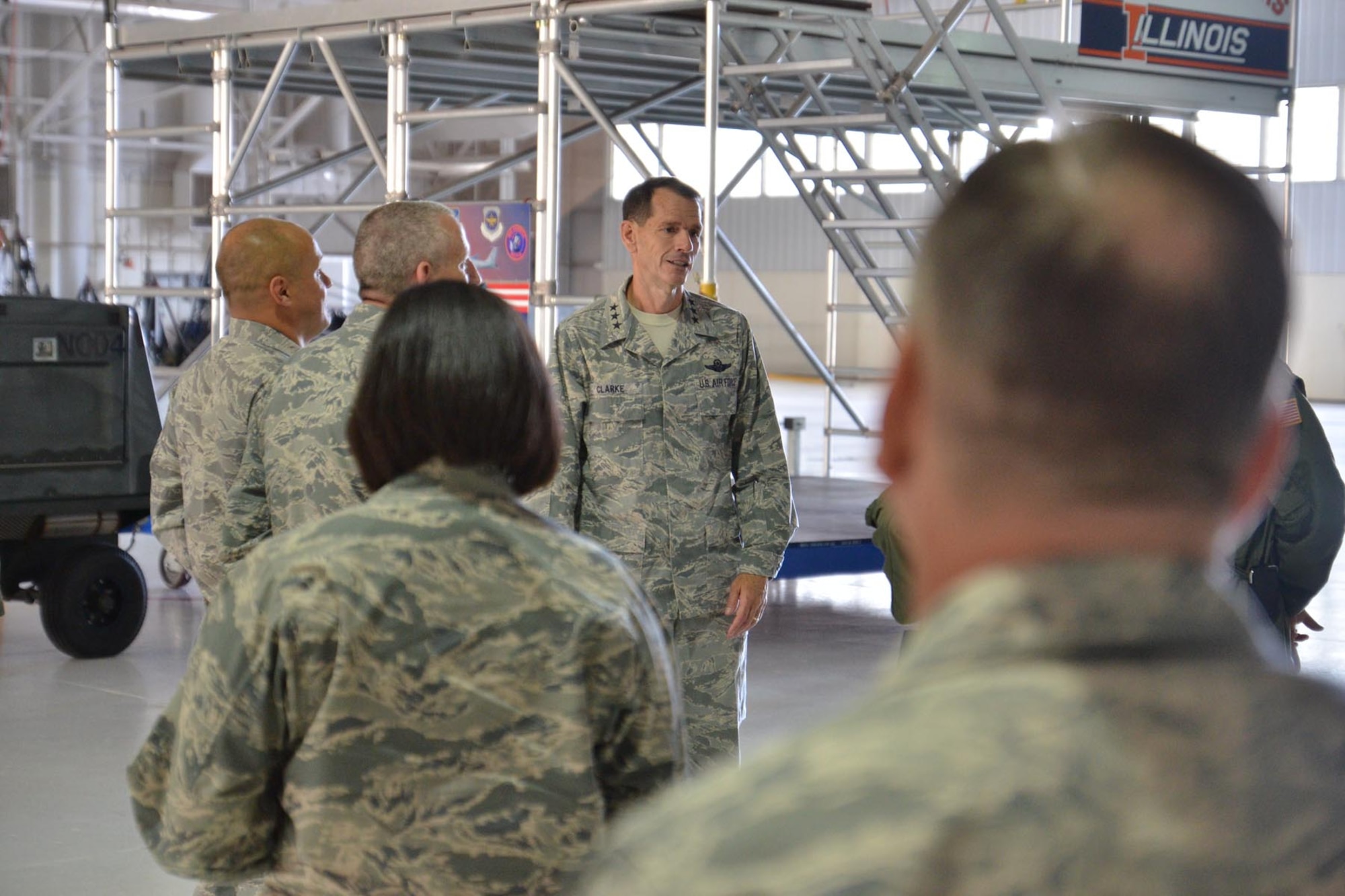 Lt. Gen. Stanley Clarke, Director of the Air National Guard discusses the hangar facility with senior staff of the 126th Air Refueling Wing during his visit to the Wing located at Scott AFB, Ill., Sept. 5, 2013. (Air National Guard photo by Master Sgt. Ken Stephens)