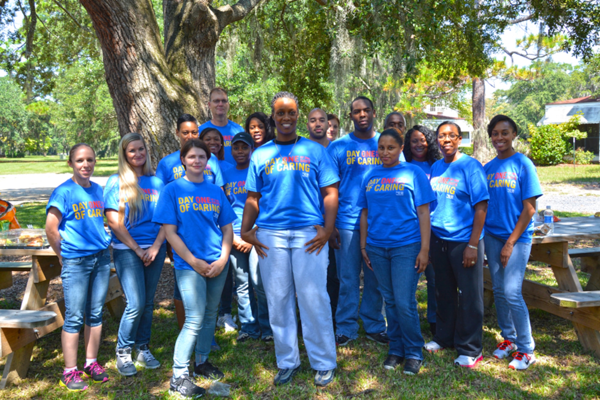 Service members from Joint Base Charleston, S.C. assist Lowcountry Orphan Relief Aug. 6, 2013 as part of Trident United Way’s Day of Caring. Day of Caring is part a Trident United Way’s campaign, which gives volunteers the opportunity to partner with local agencies and increase community engagement. LOR provides for children who have been abused or neglected and is always in need of volunteers. (U.S. Air Force photo/Tech. Sgt. Shane Ellis)