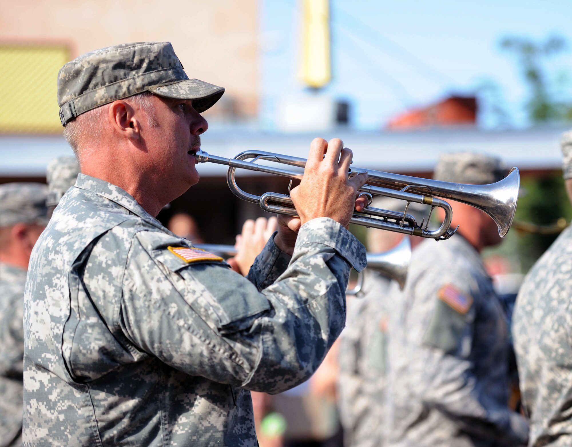 An Idaho Army National Guard bandsman plays the trumpet in the 2013 Air Force Appreciation Day parade in Mountain Home, Idaho, Sept. 7, 2013. The parade is the longest in Idaho, and this year marked the 53rd AFAD celebration. (U.S. Air Force photo by Master Sgt. Kevin Wallace/RELEASED)