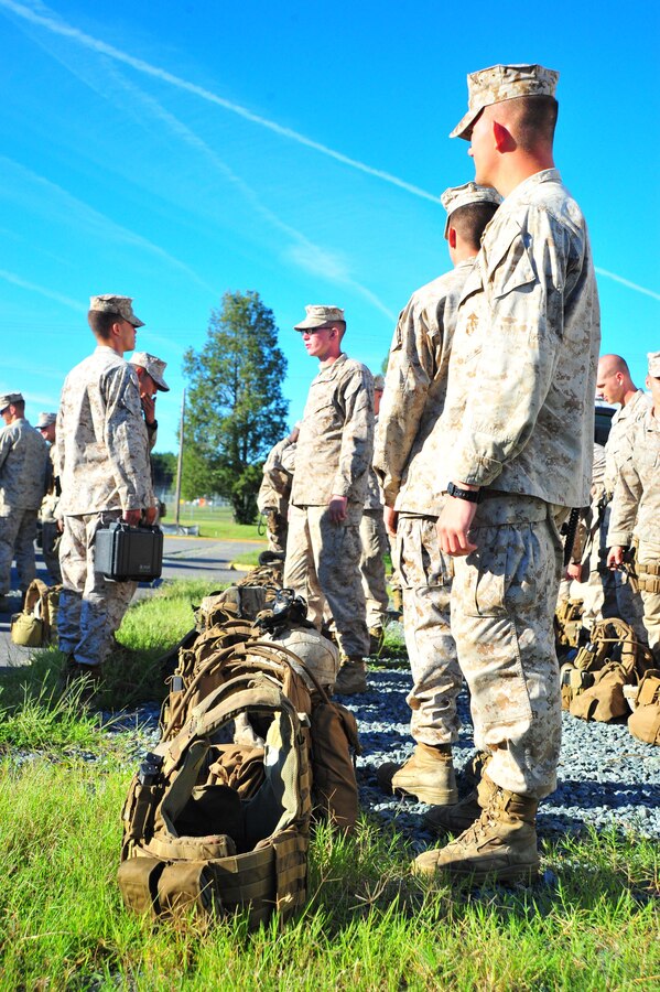 Marines prepare to train with the Virtual Combat Convoy Trainer at Camp Upsher aboard Marine Corps Base Quantico on Sept. 6, 2013. More than 50 Marines were present for the training which allows Marines to act and react as groups in simualted combat situations.