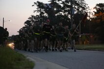 Marines with General Support Maintenance Company, 2nd Maintenance Battalion, 2nd Marine Logistics Group run in formation with Brendan O’Toole, the co-founder of the Run for Veterans, aboard Camp Lejeune, N.C., Sept. 4, 2013. The company ran in support of the program, which was founded to promote positive mental, physical and social wellbeing for veterans and their families. 