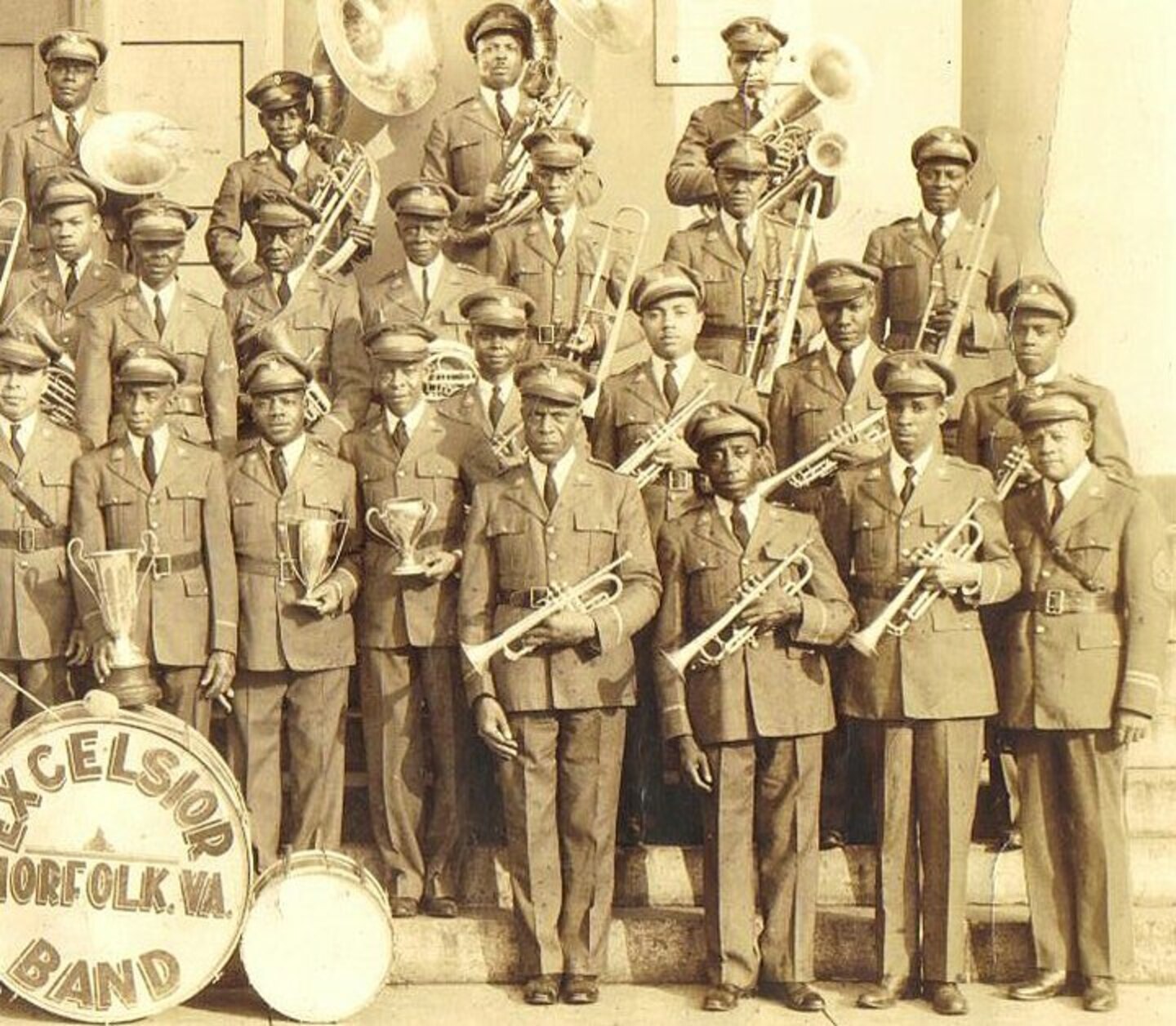 Lynette Rhodes’ grandfather, Frank Roland Robinson (back, third from right), played the sousaphone, or bass horn, in Norfolk’s iconic Excelsior Band. Robinson was a chemist assistant, who for 40 years, worked at the famous Royster Building, one of downtown Norfolk’s tallest buildings in 1912. The Excelsior Band, established in the 1890s, toured Hampton Roads, serenading captivated audiences. For generations, the Rhodes' family has enjoyed a rich legacy of Norfolk community involvement.