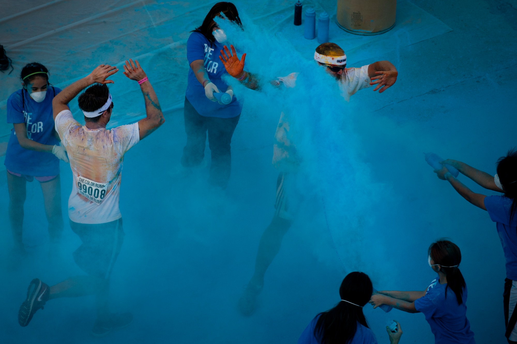 Airmen from Sheppard Air Force Base, Texas, get colorful with citizens of Wichita Falls during The Color Run, Sept. 7, 2013. There were more than 30 volunteers to help participants get colorful during five color zones.  (U.S. Air Force photo/Staff Sgt. Mike Meares) 