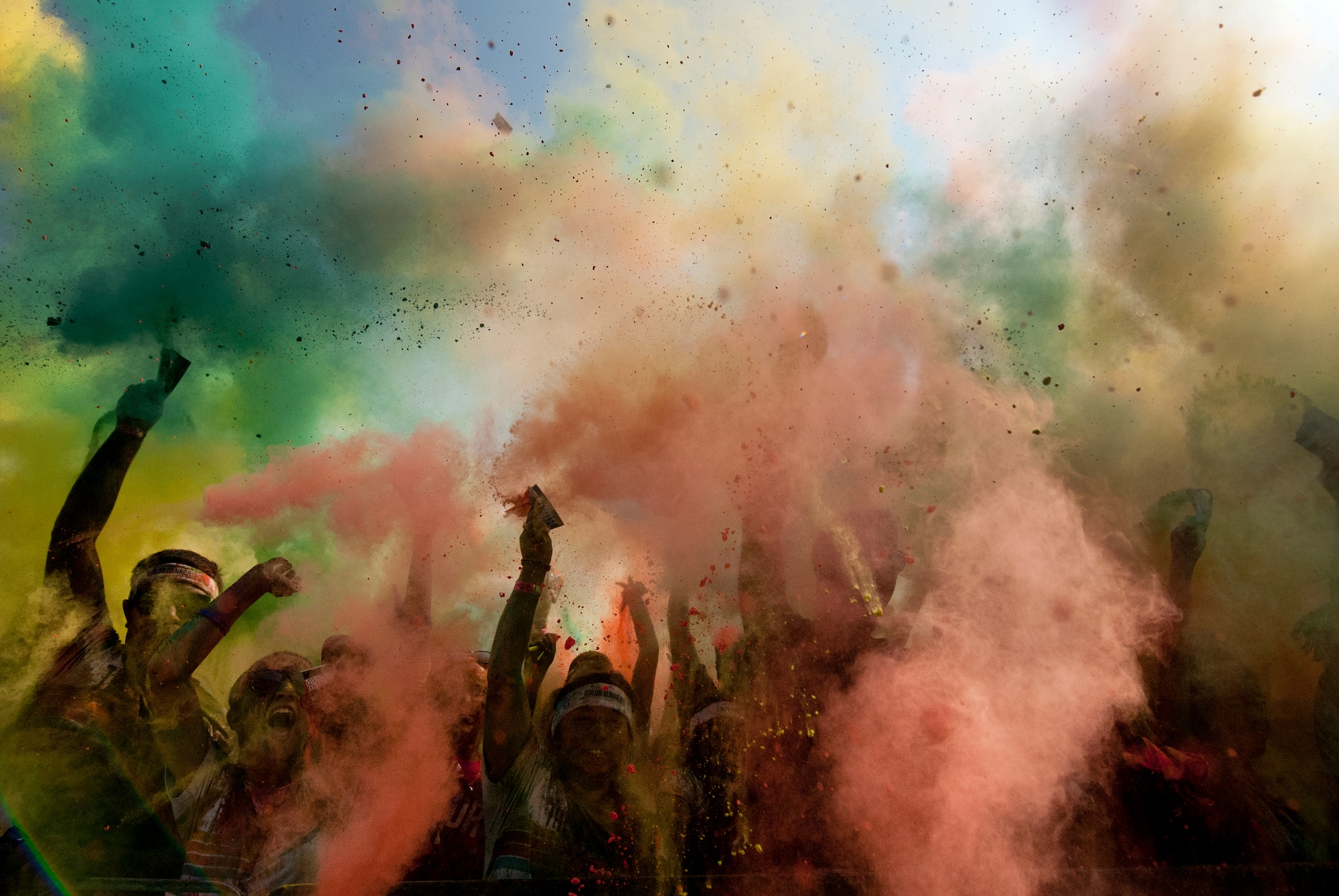 Airmen from Sheppard Air Force Base, Texas, get colorful with citizens of Wichita Falls during The Color Run, Sept. 7, 2013. There were more than 30 volunteers to help participants get colorful during five color zones.  (U.S. Air Force photo/Staff Sgt. Mike Meares) 